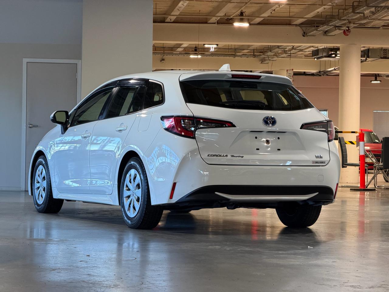 Touring Hybrid G-X Plus